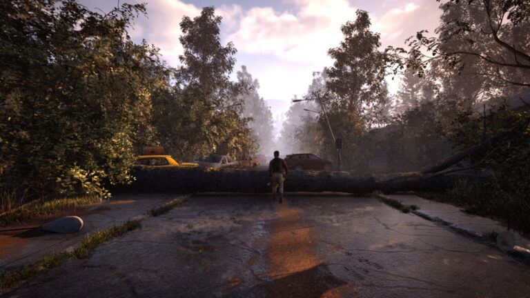 A man stands before a tree blocking the road in A Quiet Place: The Road Ahead