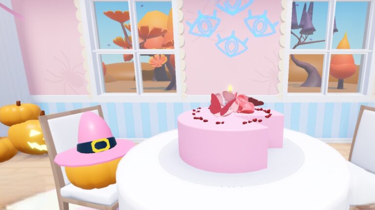 A pink cake on a table in Cake Off Roblox