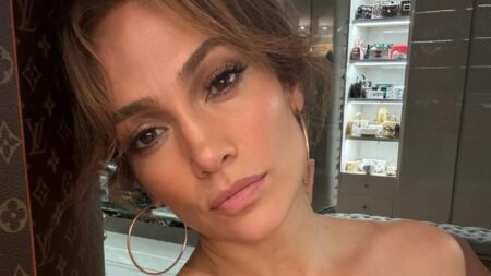 Jennifer Lopez takes selfie inside her home.